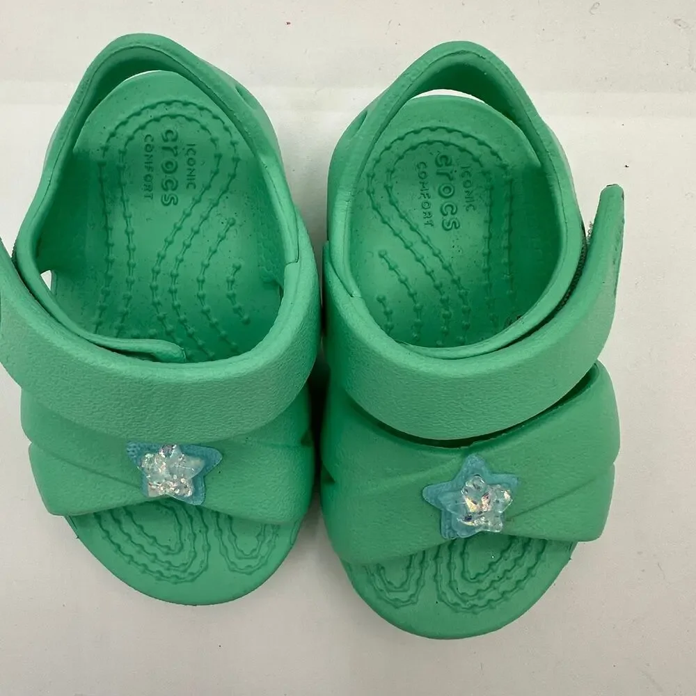 Crocs size 4 star mint green sandals